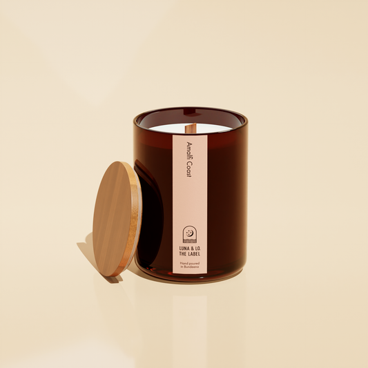Close-up view of Amalfi Coast Candle by Luna & Lo featuring a wooden lid and label