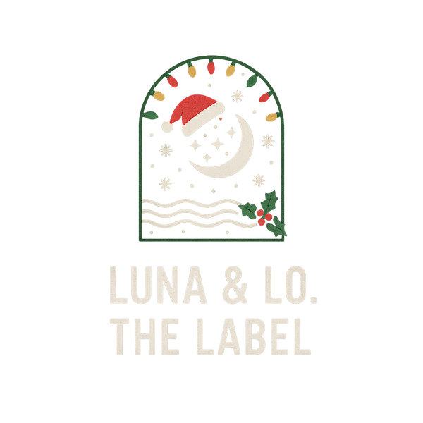 Decorative logo with a Santa hat, moon, and holly leaves on a white background, featuring the brand 'Luna & Lo.'