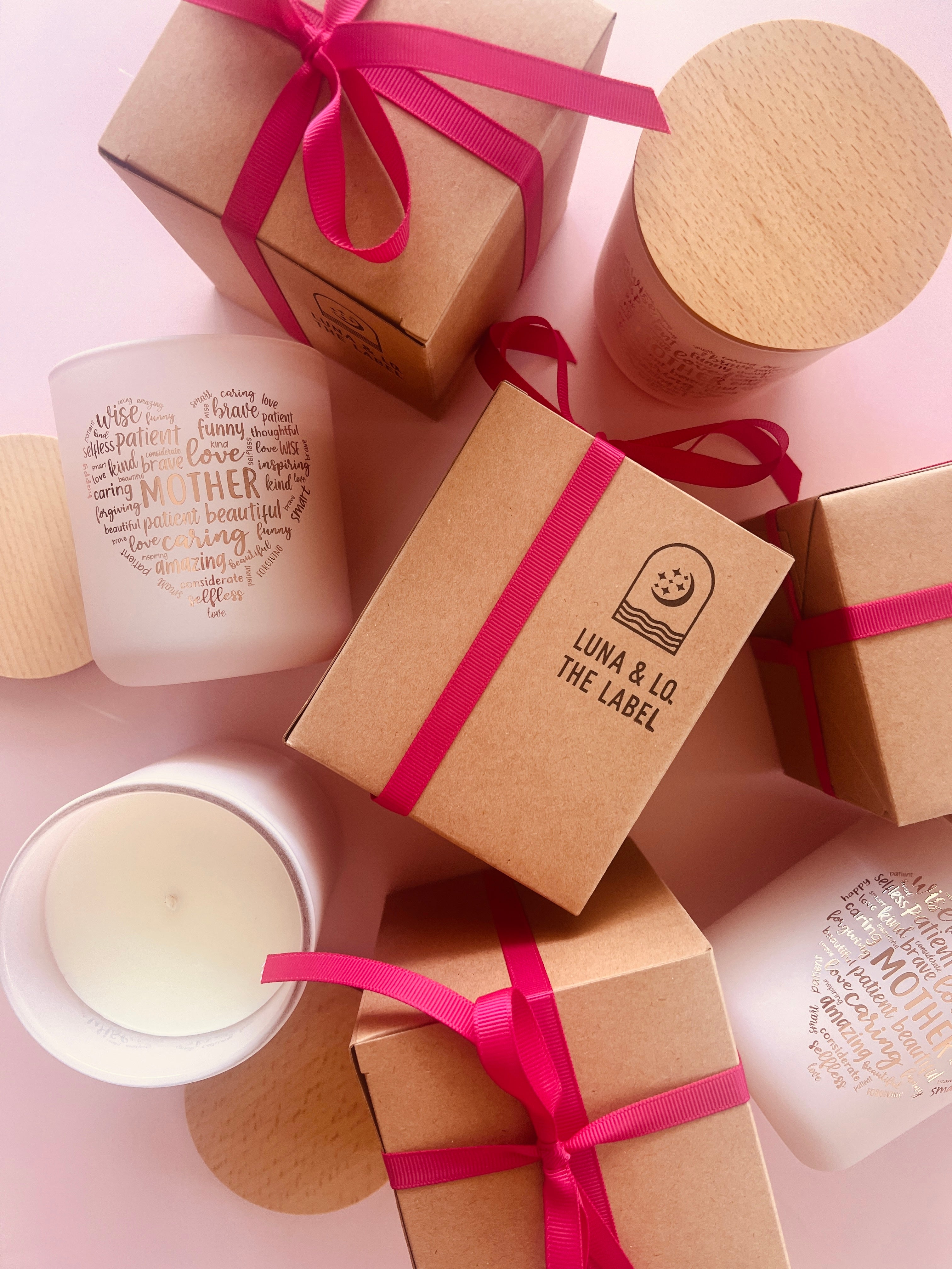 Mothers Day candles on a pink background